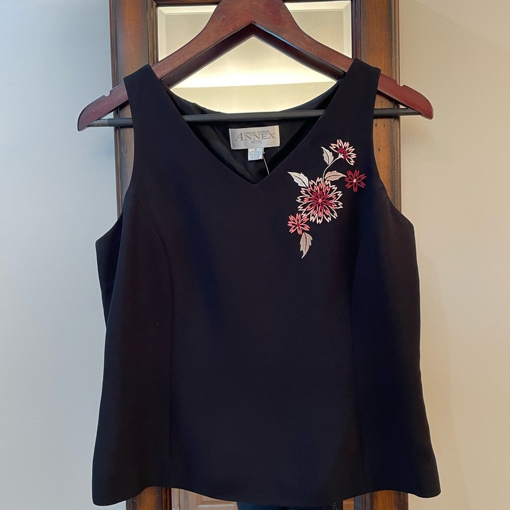 Sleeveless black blouse petite